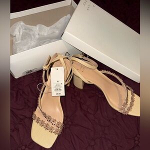 Elegant Tan Block Heel Sandals With Floral Straps